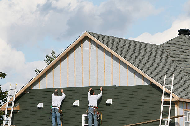 Professional Siding Contractor technician working in Locust Valley, NY